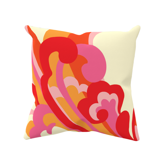 bright red, orange, and pink swirls from Fibbage 3 on a cream pillow