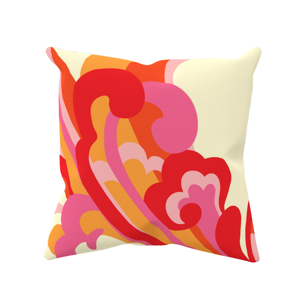 bright red, orange, and pink swirls from Fibbage 3 on a cream pillow